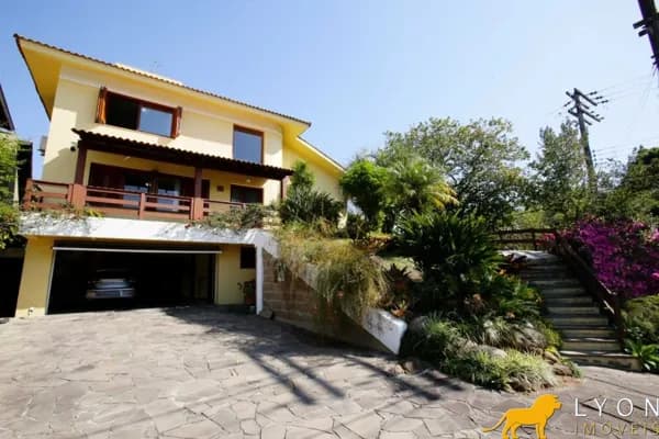 BELÍSSIMA CASA EM CONDOMÍNIO FECHADO ZONA SUL/ POA