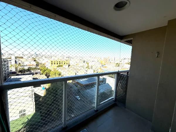 Apartamento Padrão com sacada e churrasqueira