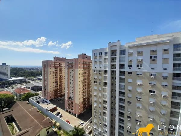Apartamento com sacada e churrasqueira