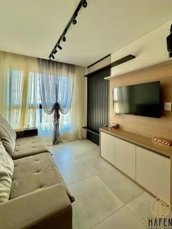 Apartamento em quadra mar com 2 suítes no Centro de Navegantes/SC