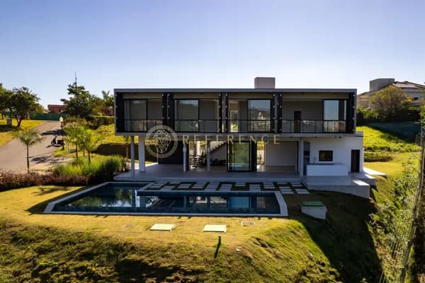 CASA NO CONDOMÍNIO FAZENDA SERRA AZUL | 504,73 M² CONSTRUÍDOS | 4 SUÍTES | PISCINA - JUNDIAÍ/SP