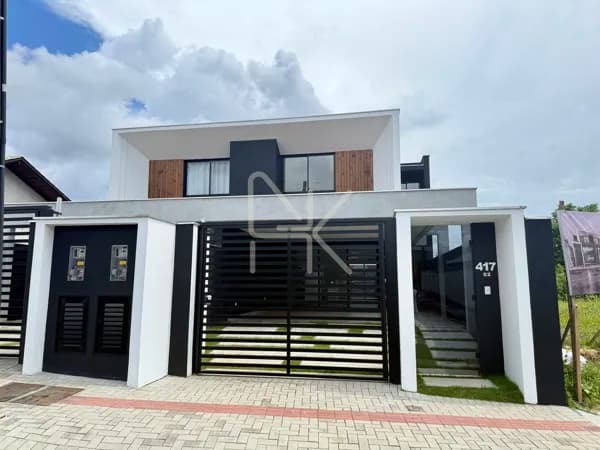 Sofisticação e conforto no coração do Saguaçú - Sobrado geminado com 3 suítes, piscina e 206 m² privativos