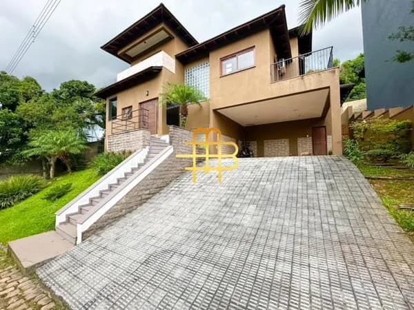 LOCAÇÃO | Casa com 3 dormitórios e piscina em Condomínio Fechado de Gravataí
