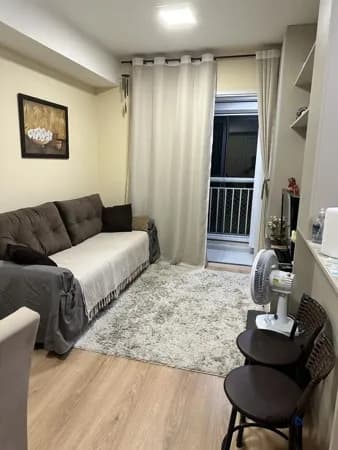 Aconchegante Apartamento com Varanda Envidraçada e 2 Vagas de Garagem