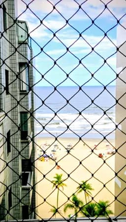 Apartamento prédio frente ao mar em Praia Grande
