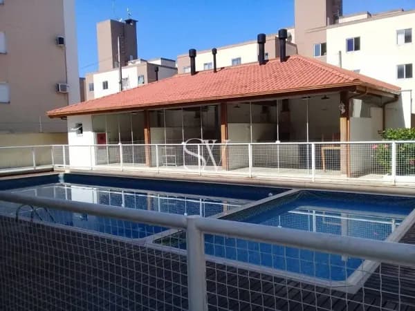 Apartamento a venda de 02 Dormitórios com mobília planejada no bairro Serrarias em São José-SC