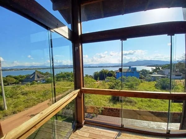 Casa com 3 dormitórios à venda, 169 m² por R$ 1.100.000 - Ponta da Piteira - Ibiraquera - Imbituba/SC