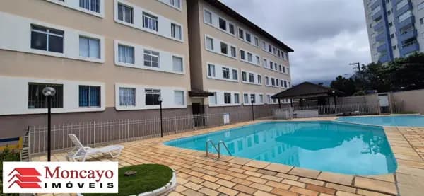 Apartamento com 2 quartos próximo ao mar para venda na Prainha, Caraguatatuba - SP.