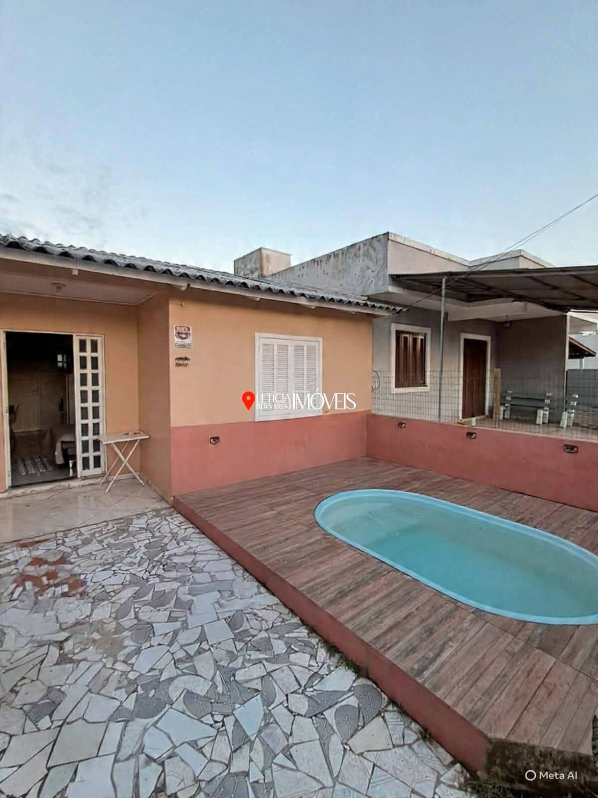 CASA GEMINADA COM PISCINA EM NOVA TRAMANDAÍ – R$ 250.000,00
