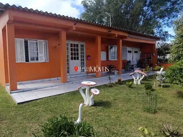 CASA COM ANEXO NO CENTRO – R$ 390.000,00 PRÓXIMA AO MAR