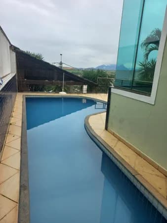 Casa Alto Padrão no condomínio Golden Sun, com 4 quartos sendo 3 suítes, piscina, área de lazer, em Lagoa, Macaé/RJ