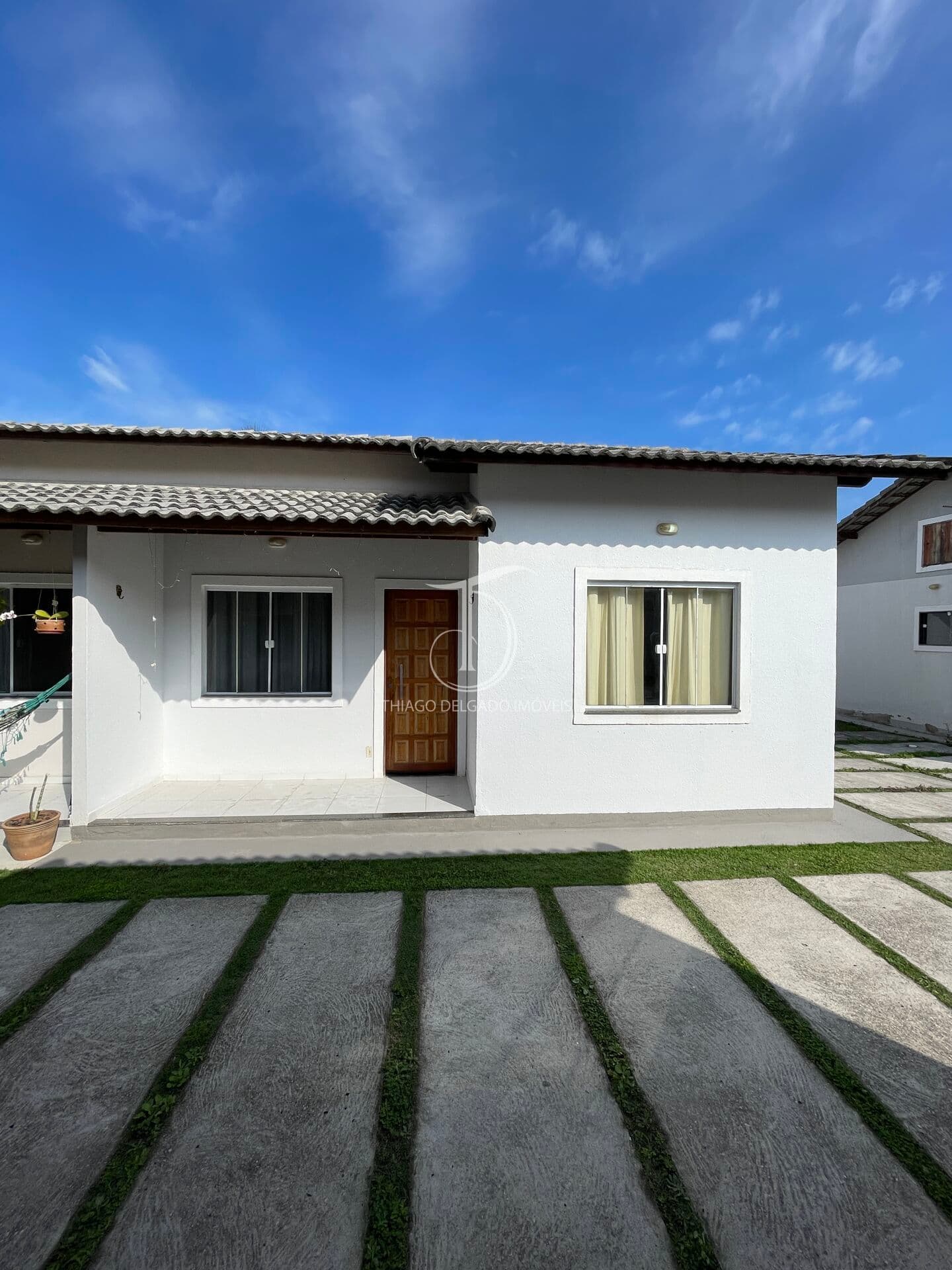 Casa charmosa em condomínio tranquilo