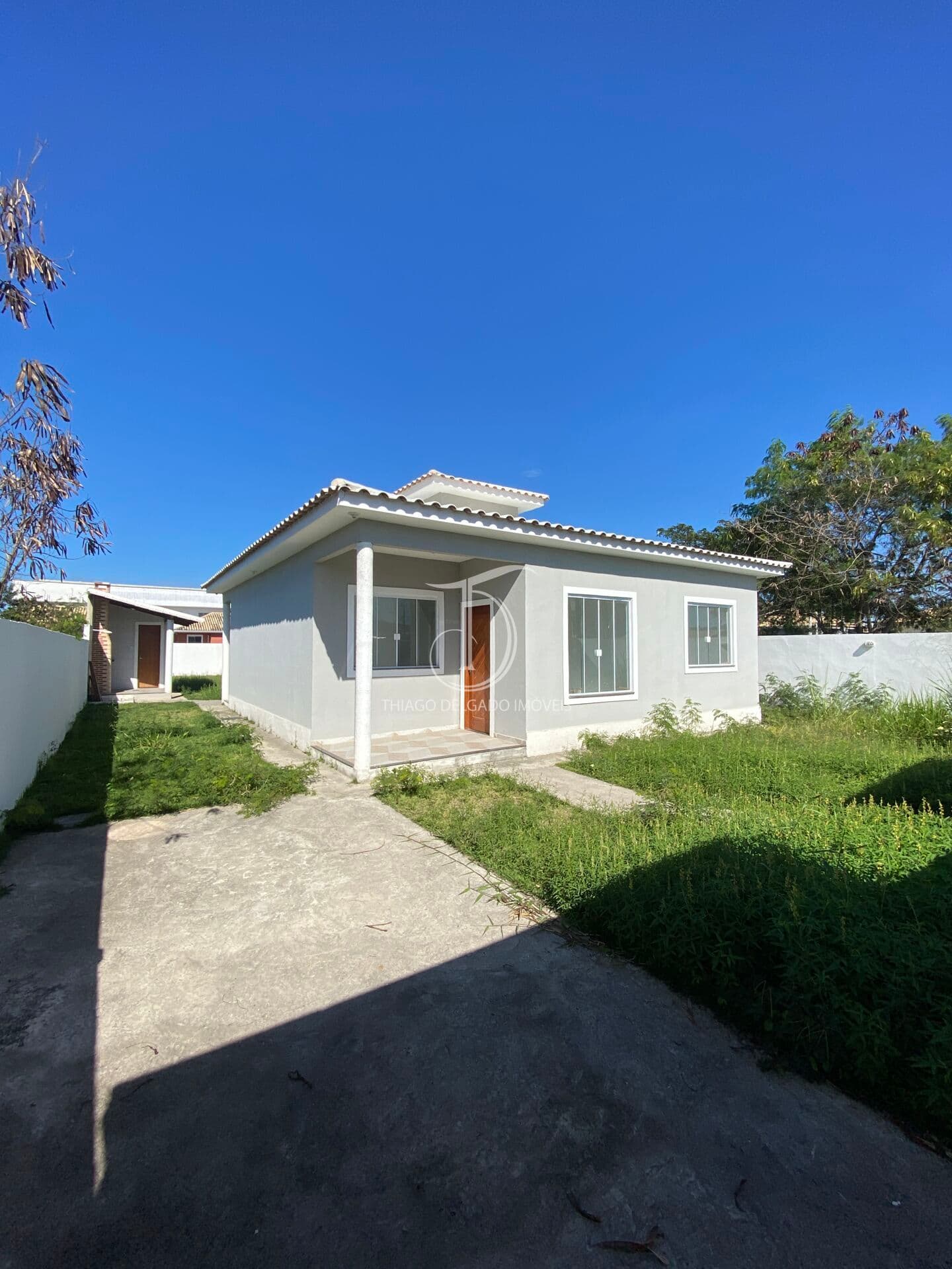 Casa aconchegante com ótimo espaço interno e quintal gramado!