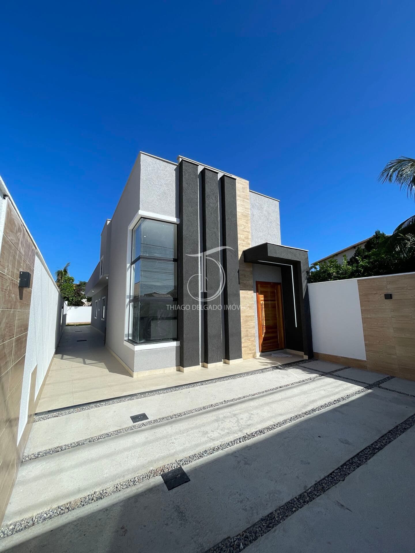 Casa moderna com 3 suítes – fachada envidraçada, cozinha com ilha e ambientes integrados!