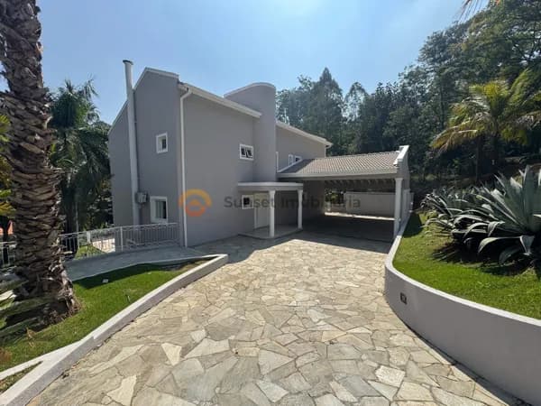 Casa com 4 suítes à venda, 425m² em terreno de 1.400m² por R$ 9.500.000 — Residencial Tamboré, Barueri/SP