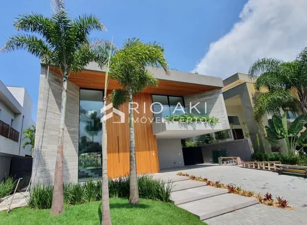 Mansão de 852m², contemporânea, 5 suítes, Triplex, Piscina e Spa, possibilidade Mobiliada, na Barra da Tijuca.