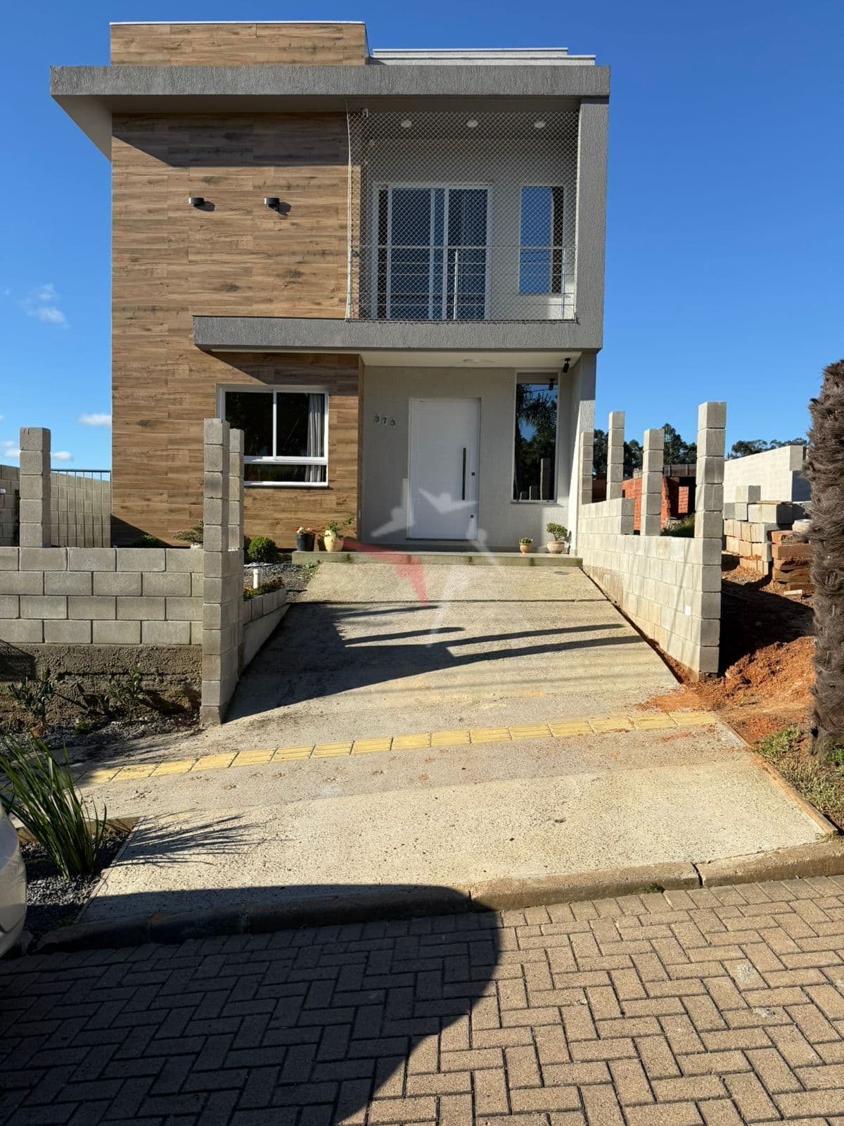 Linda casa à venda no bairro planejado Vivare, em Viamão.