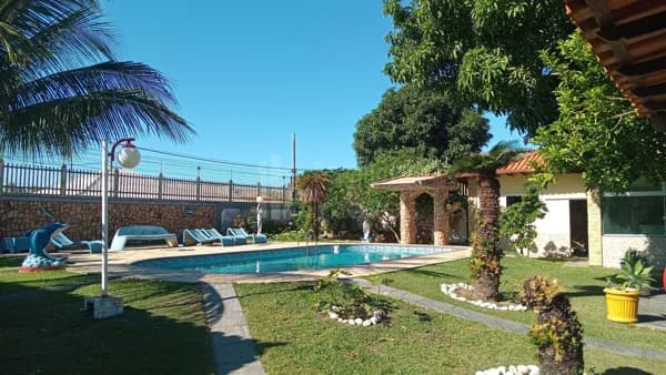 Casa quatro quartos sendo duas suítes 200 metros da lagoa