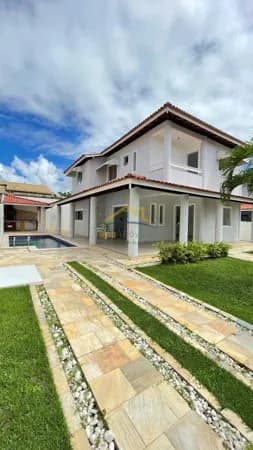 Casa em Condomínio 4 suítes Piscina em Buraquinho 430m²