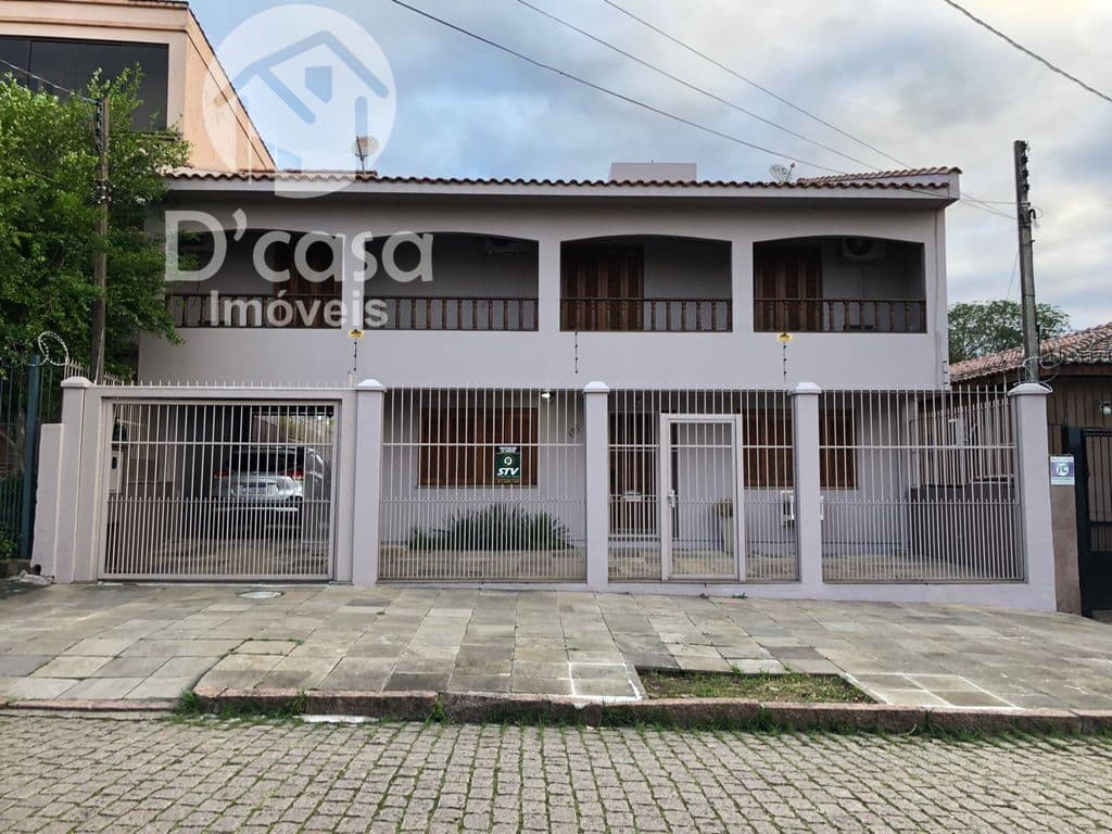 Excelente casa com 4 dormitórios à venda, 412 m² por R$ 1.350.000 - Medianeira - Porto Alegre/RS