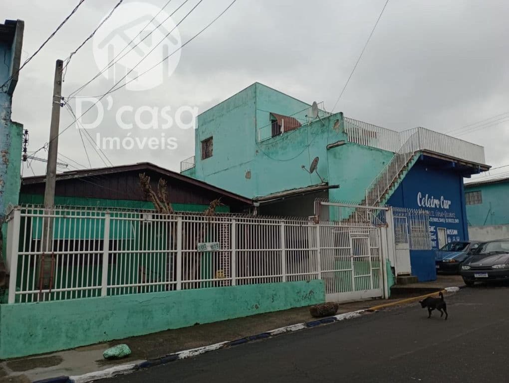 Terreno de esquina com casa e prédio comercial à venda, 714 m² por R$ 585.000 - Vila Monte Carlo - Cachoeirinha/RS
