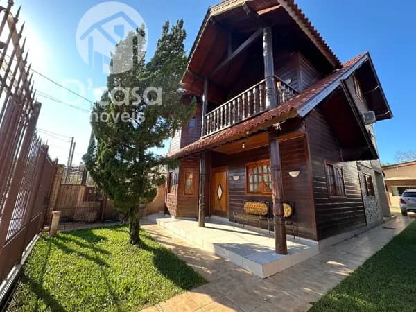 Belíssima casa com 4 dormitórios à venda, 223 m² por R$ 650.000 - Centro - Gravataí/RS