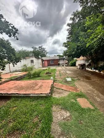 Terreno com casa de madeira, à venda por R$ 266.000,00 - excelente localização em Gravataí/RS.
