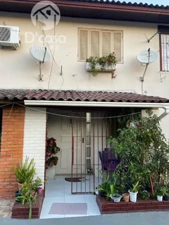 Sobrado em condomínio com 2 dormitórios à venda, 98 m² por R$ 250.000 - Vila Ponta Porã - Cachoeirinha/RS