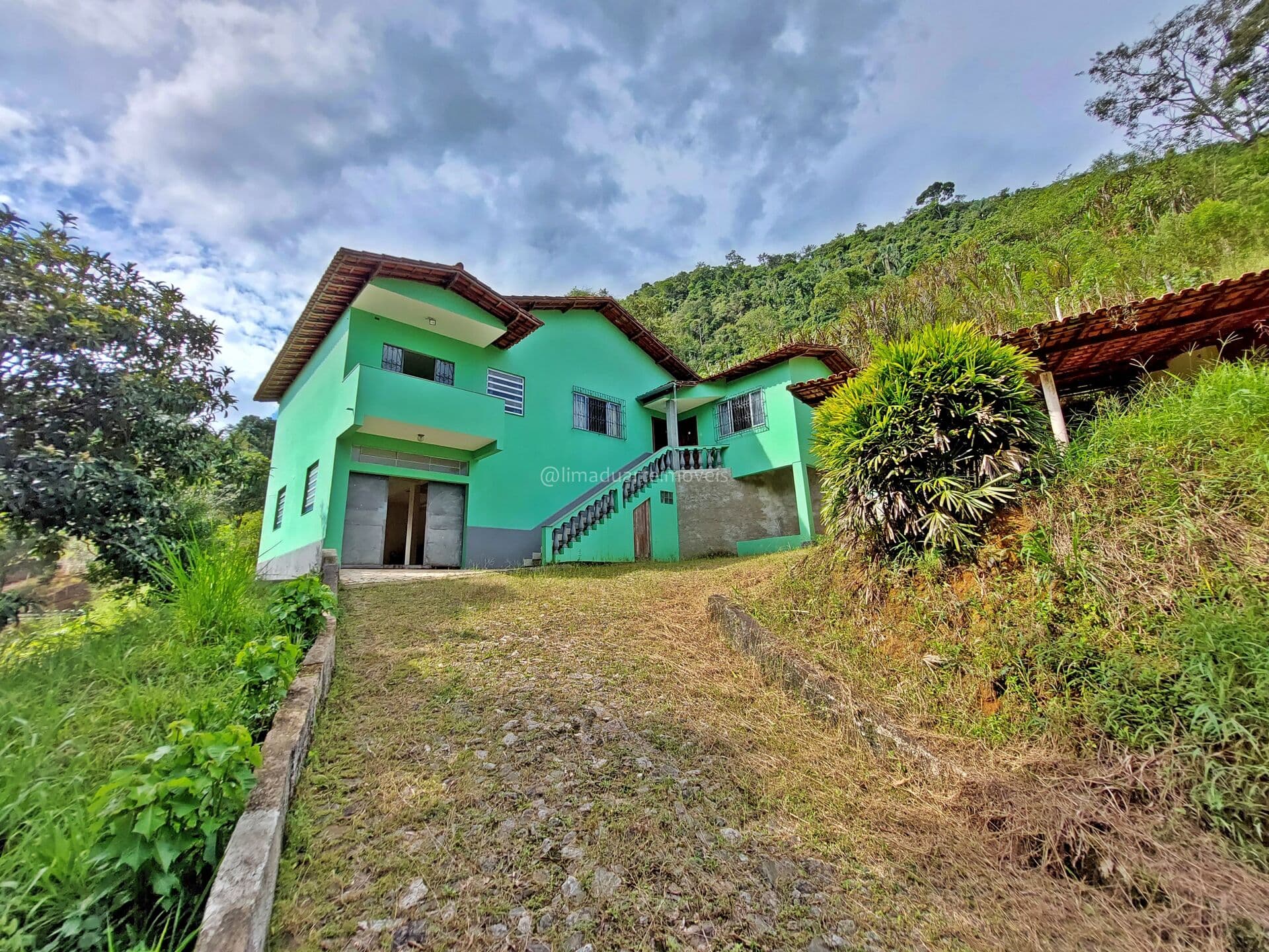 Casa em Lima Duarte - Vila Monteiro