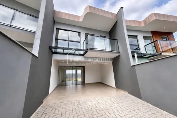 Sobrado Geminado com 1 suíte com closet + 2 quartos e 2 vagas de garagem, no Costa e Silva