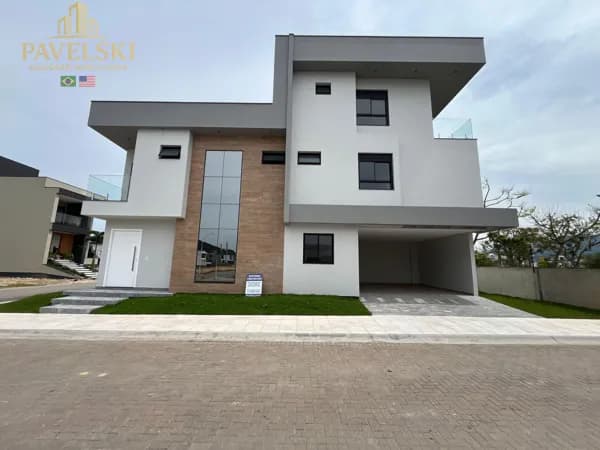 Casa de esquina em Condomínio fechado 4 dormitórios sendo 4 suítes + escritório - Deltaville / Biguaçu