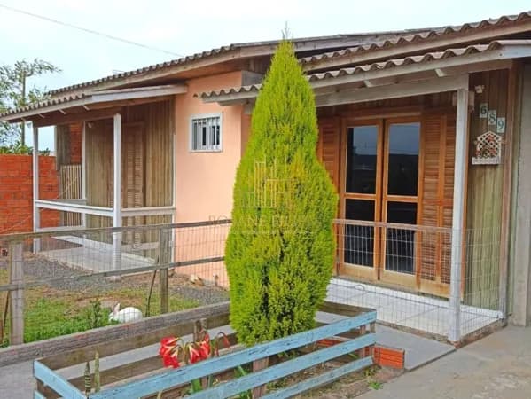 Casa com 3 dormitórios à venda, 130 m² por R$ 270.000 - Balneário Arroio do Silva/SC