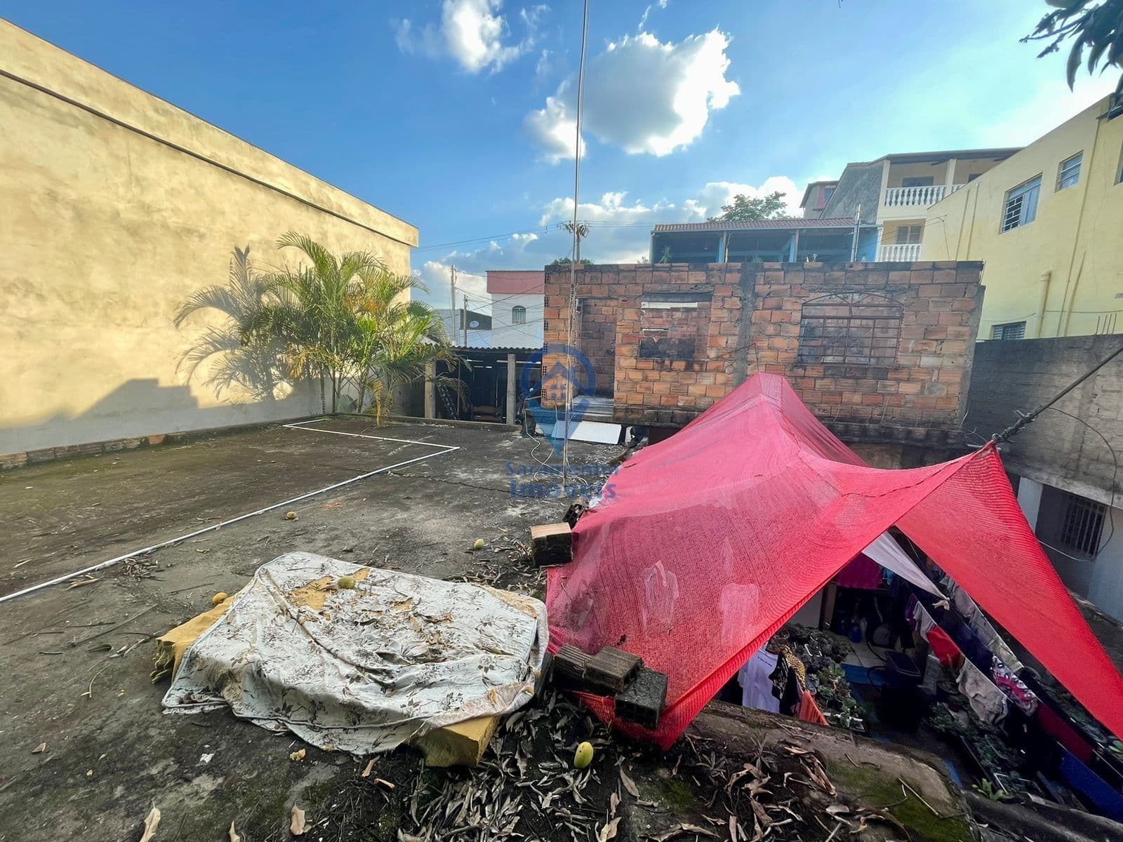 OPORTUNIDADE DE LOTE COM CASAS COM ESCRITURA E REGISTRO NO BAIRRO TUPI