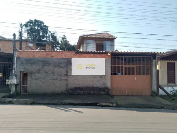Casa de alvenaria com 3 dormitórios no bairro Vera Cruz em Gravataí.