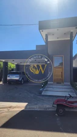 Casa sofisticada com 3 suítes, área gourmet e piscina com prainha no Reservas do Bosque