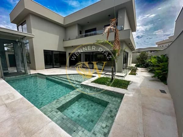 Casa de luxo à venda no Quinta do Golfe – 4 suítes, piscina aquecida e elevador