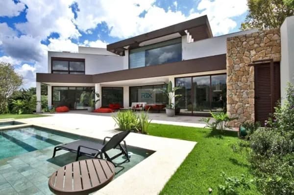 Casa mobiliada à venda em Alphaville Tamboré 1, 4 suítes, vista para mata – Barueri