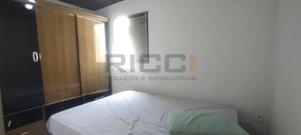 Casa com Edícula