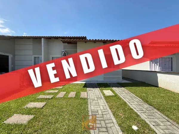 Casa geminada em condomínio fechado no Bairro Rio da Onça