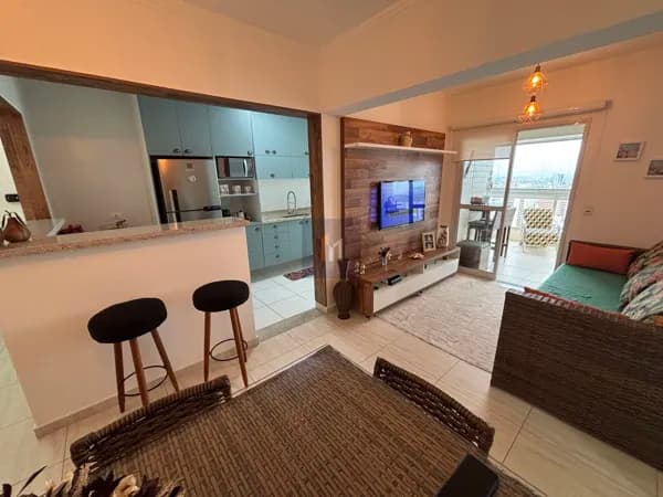 Apartamento vista mar 2 dormitórios 1 suíte e 1 vaga de garagem no bairro Tupi
