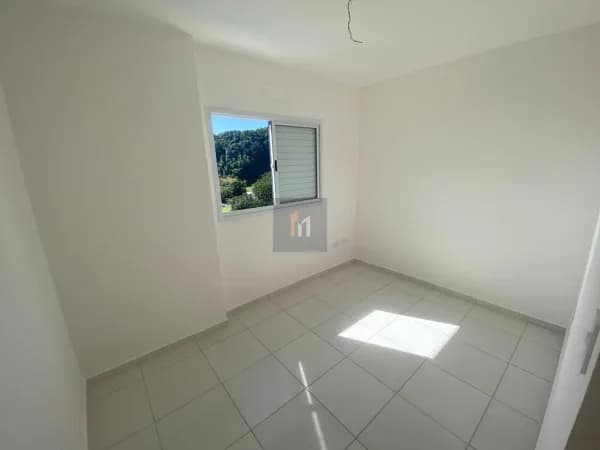 Apartamento à venda no bairro Boqueirão em Praia Grande, SP. 2 dormitórios sendo 1 suíte.