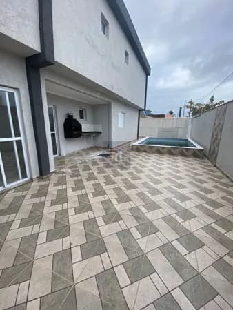 Casa Sobreposta de baixo, 2 dormitórios 1 suite, piscina com churrasqueira, 2 vagas, Itanhaém