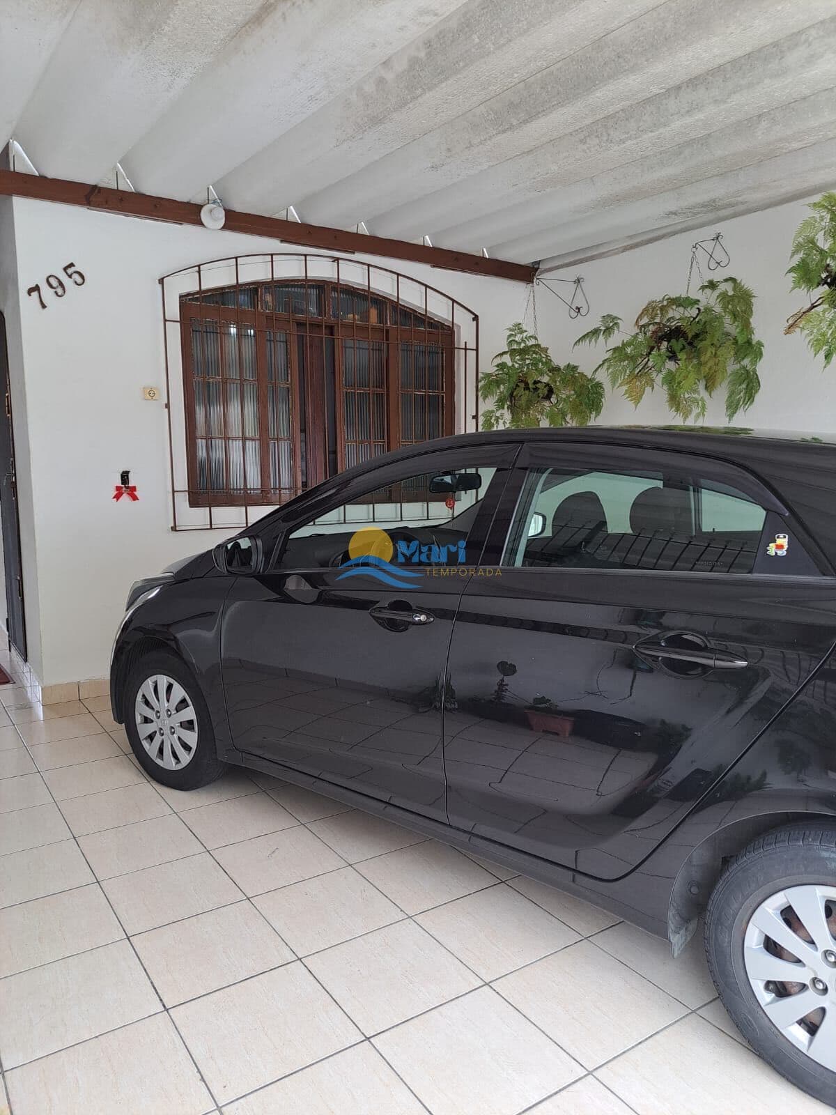 Casa individual à venda no bairro Caiçara em Praia Grande, SP. 2 dormitórios sendo uma suíte