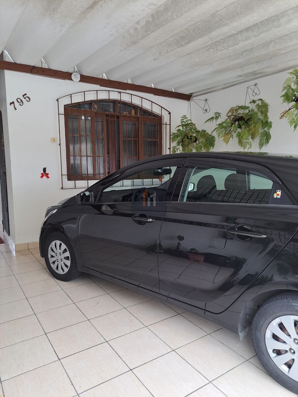 Casa individual à venda no bairro Caiçara em Praia Grande, SP. 2 dormitórios sendo uma suíte