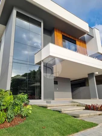 Casa nova em condomínio fechado com 4 dormitórios e área gourmet integrada