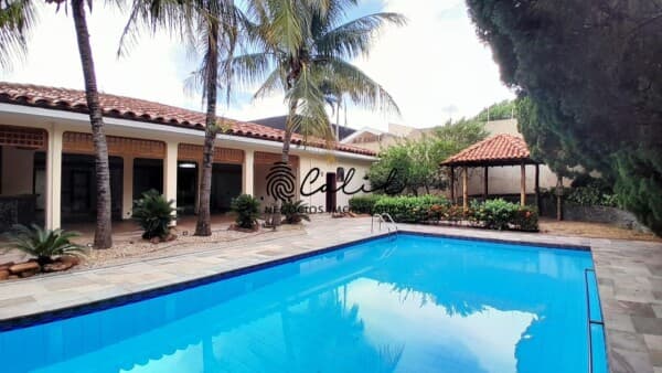 Casa com 5 dormitórios, 442 m² - venda por R$ 1.800.000,00 ou aluguel por R$ 7.019,00/mês - Jardim Sumaré - Ribeirão Preto/SP