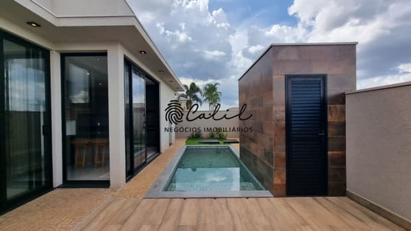 Casa com 3 dormitórios á venda, 190 m² por R$ 1.600.000,00 - Quinta dos Ventos - Ribeirão Preto/SP