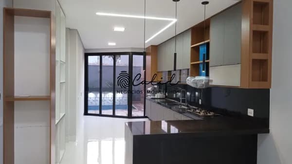 Casa térrea localizado no condomínio Quinta dos Ventos, com piscina aquecida, área gourmet completa, 188m² de construção - Ribeirão Preto/SP