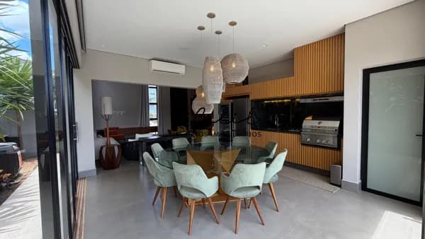 Casa térrea em condomínio Alphaville III com 4 suítes, área gourmet e 380 m² de construção