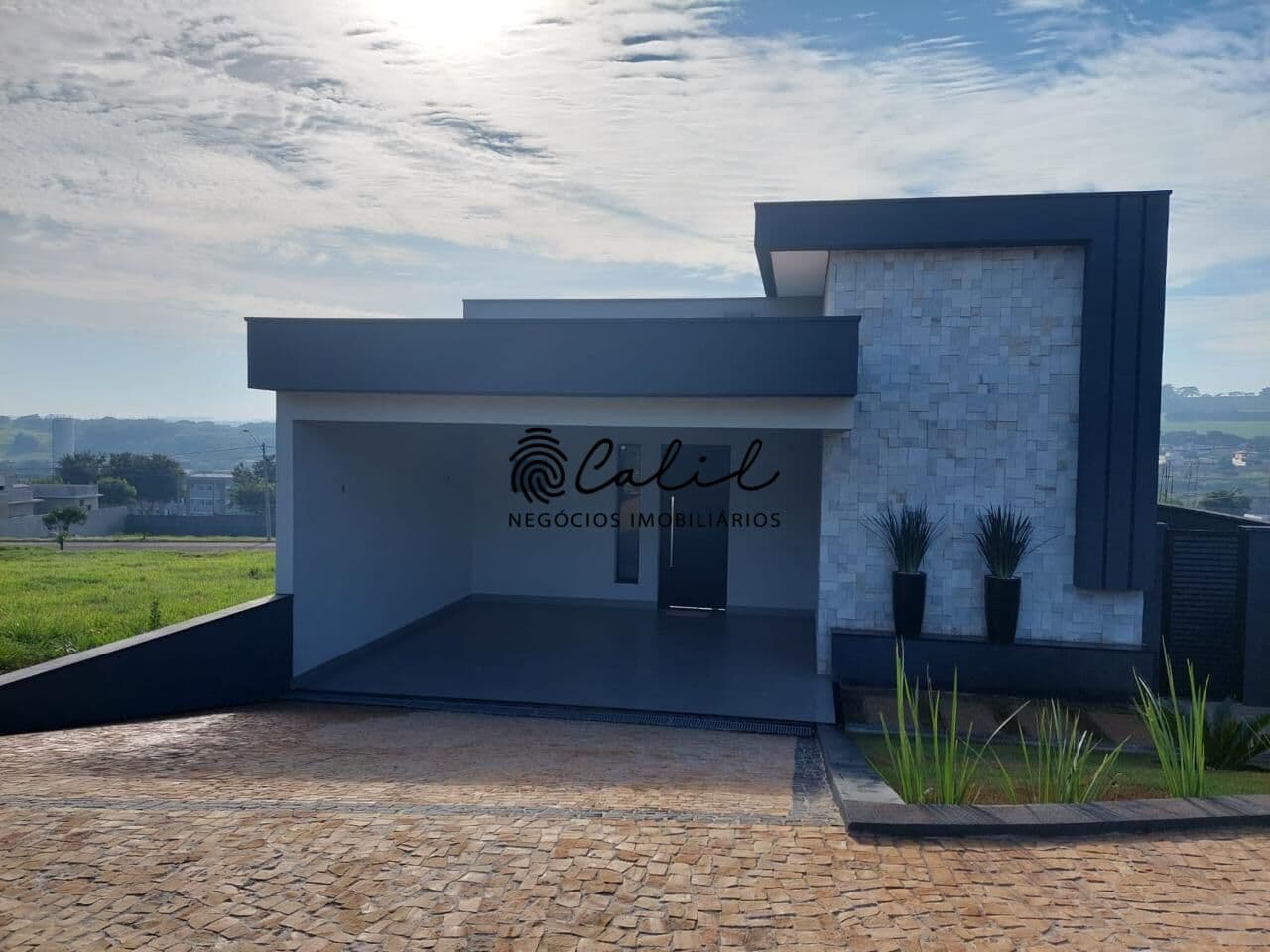 Casa térrea com 3 suítes, 144m² à venda por R$ 810.000,00 - Condomínio Terras deSanta Martha, Ribeirão Preto/SP